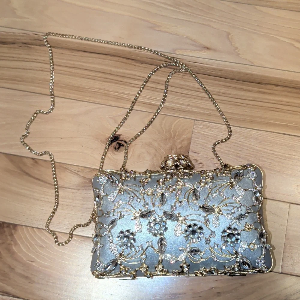 Silver Leather Clutch With Gold And Crystal Floral Embellishments